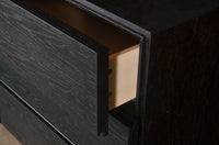 Black dresser with multiple drawers