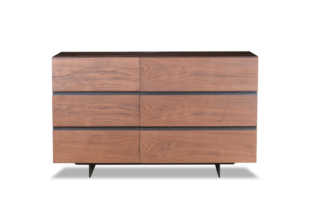 Wooden dresser with four drawers on a white background
