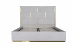 Modern bed with light gray headboard and gold accents on a white background