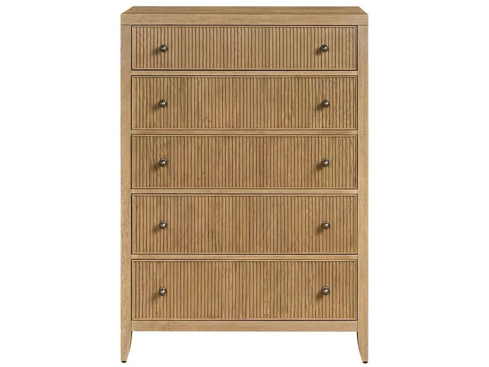A beige wooden chest of drawers with five drawers, each having a handle on the right side.