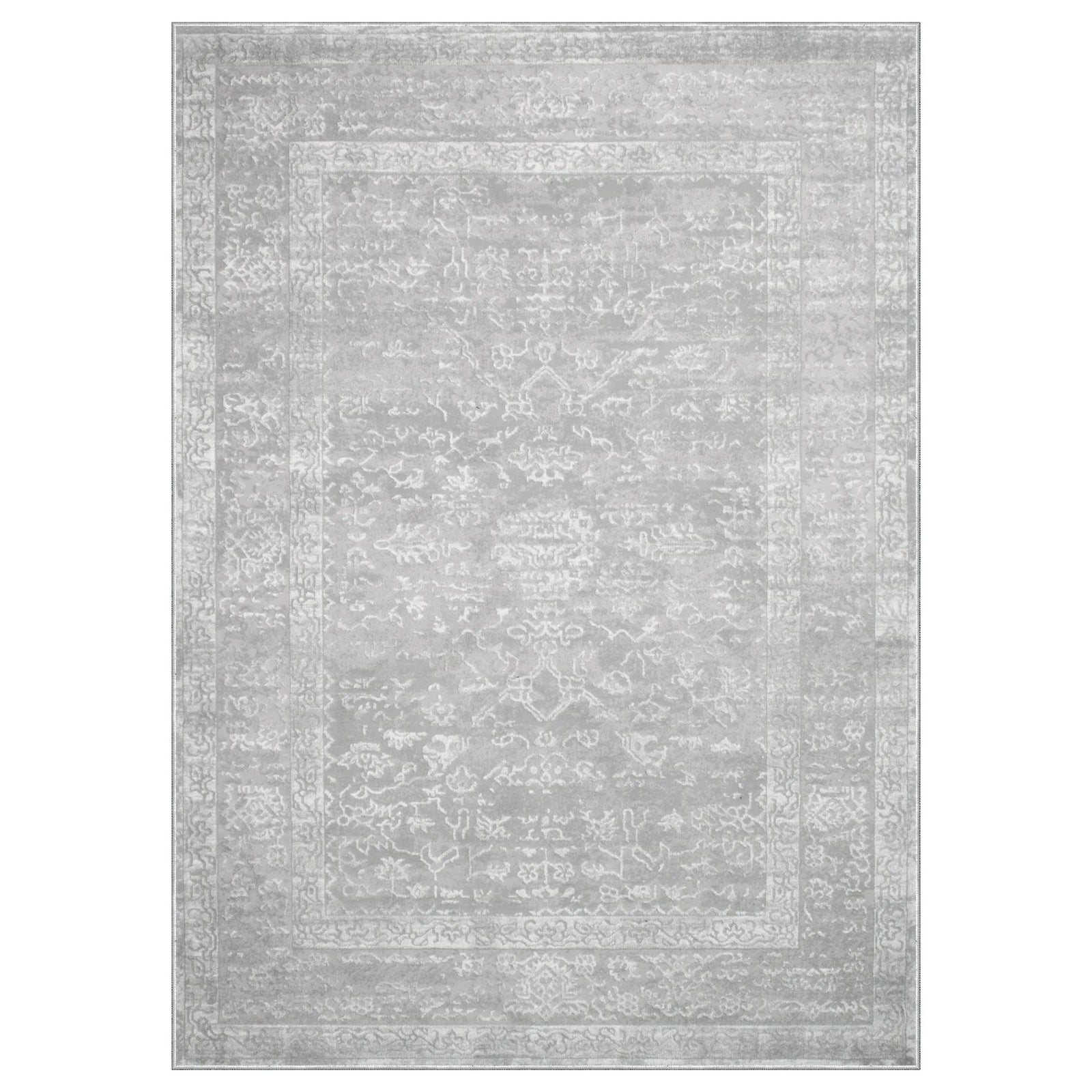 Gray area rug with subtle pattern on a white background