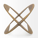 A round,glod metal decorative object with a geometric design.
