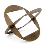 A round,glod metal decorative object with a geometric design.