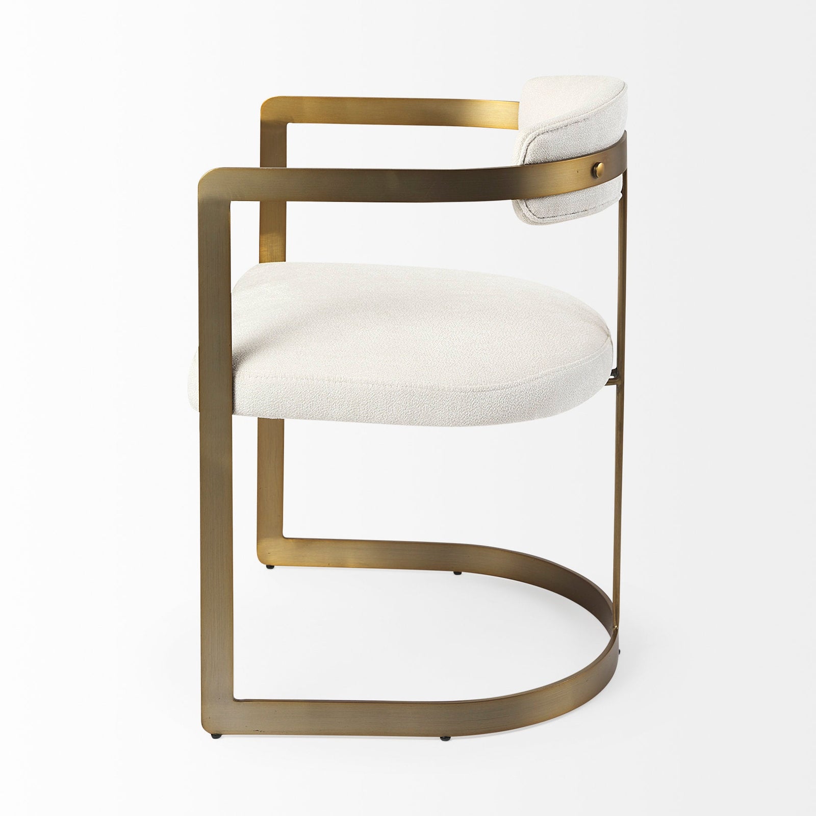Chair with white cushioned seat and backrest on a gold metal frame against a white background