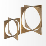 Bronze decorative object with geometric design on a white background