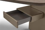 Brown drawer being pulled out from a wooden surface