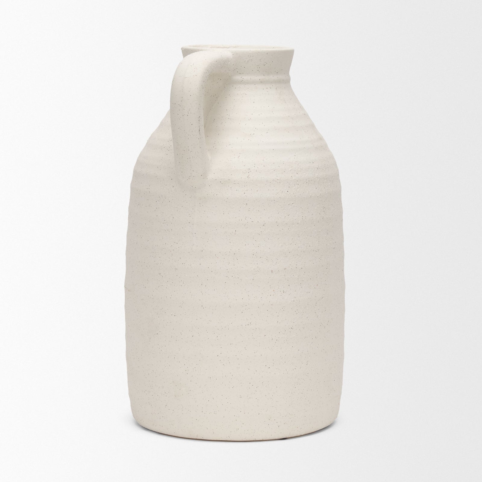 White ceramic pitcher on a white background