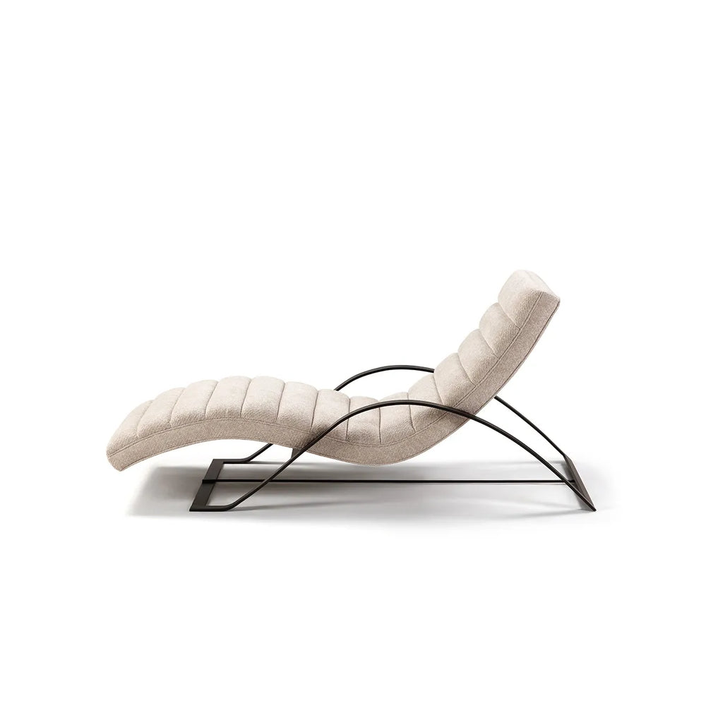 Modern lounge chair with curved design on a white background