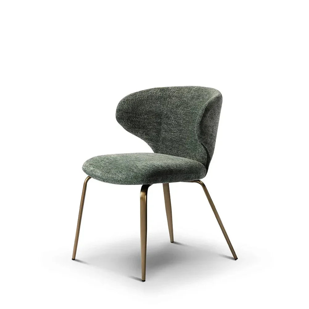 Green upholstered chair with gold legs on a white background