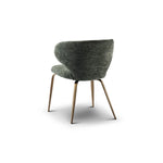 Green upholstered chair with wooden legs on a white background
