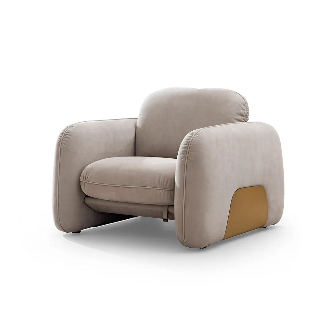 Beige armchair with a brown patch on a white background