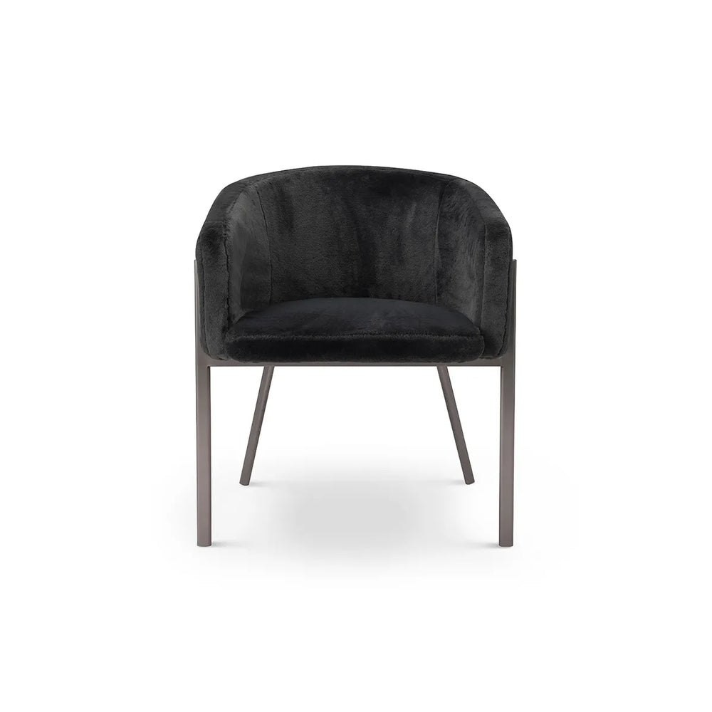 Black armchair with metal legs on a white background