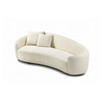 Beige sofa with two cushions on a white background