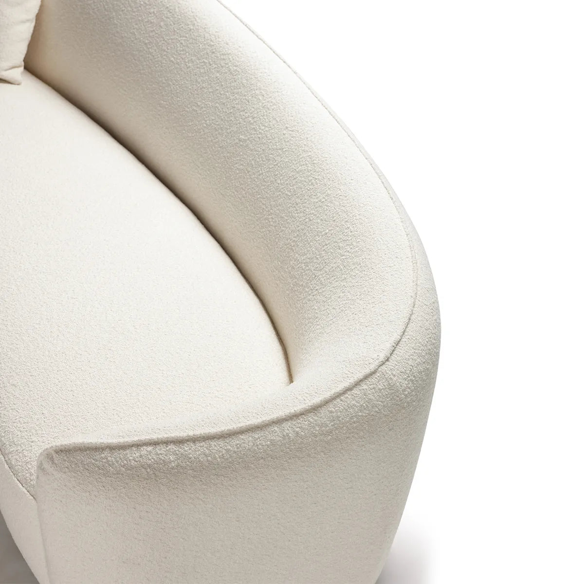 Close-up of a textured beige chair on a white background