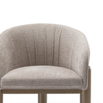 Gray upholstered chair on a white background