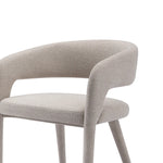 Gray upholstered chair on a white background