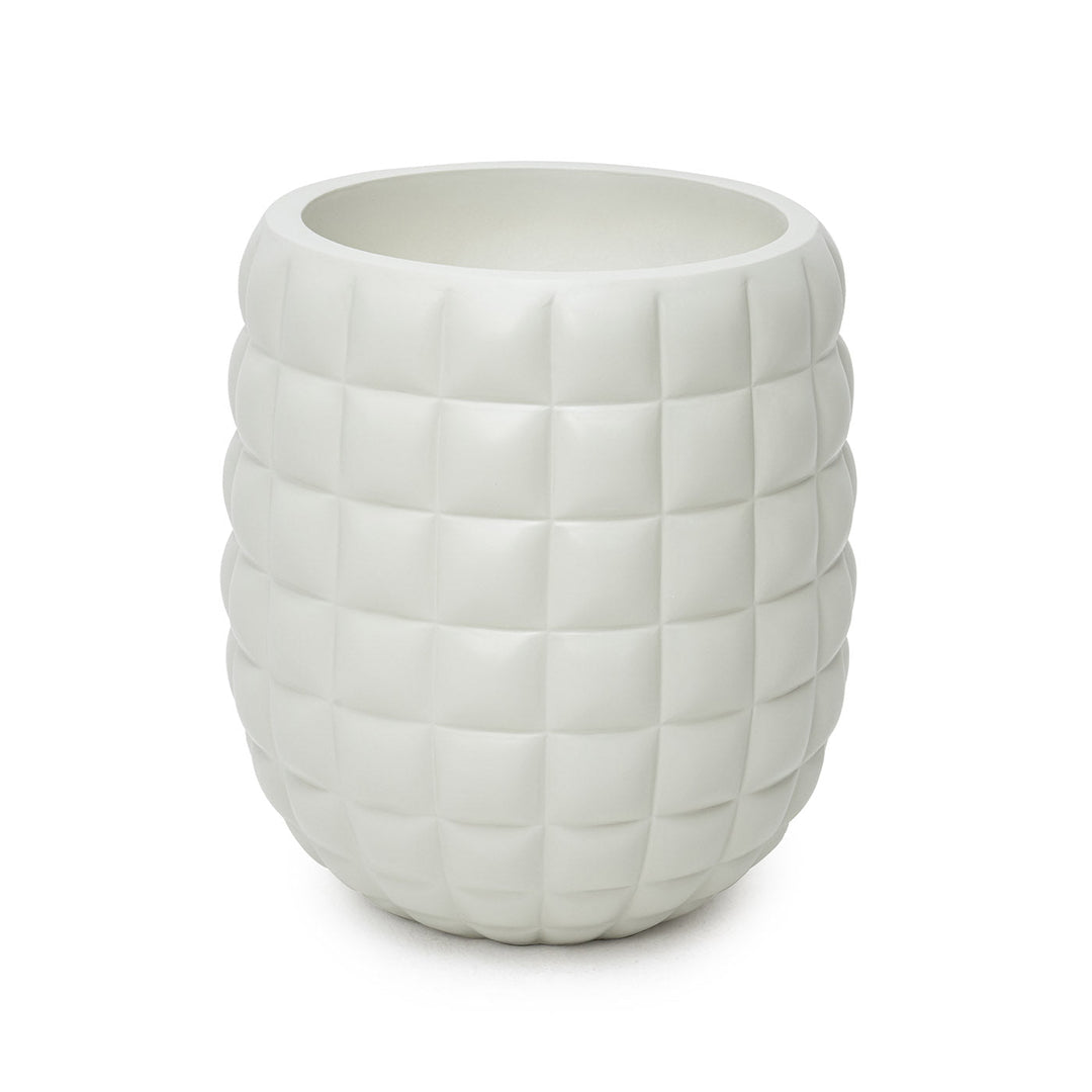 A beige 24-inch planter made of fiberglass with a textured indoor/outdoor design.