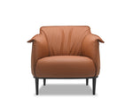 Brown leather armchair on a white background
