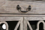 Wooden cabinet with decorative glass doors on a white background