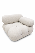 Modern beige lounge chair on a white background
