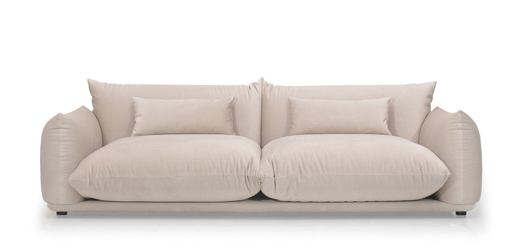 Beige sofa with cushions on a white background