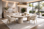 Modern dining room with a long table and chairs, featuring a chandelier and large windows.