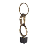 Decorative sculpture with intertwined loops on a black square base against a white background