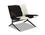 Modern chair with black and white cowhide pattern on a white background