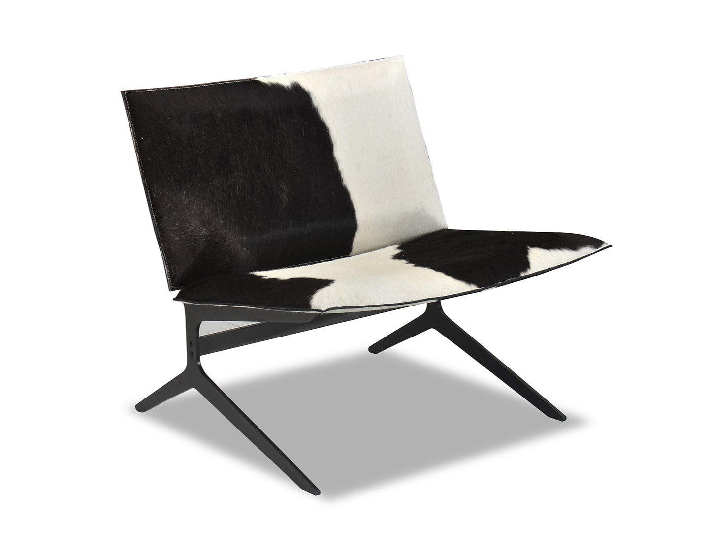 Modern chair with black and white cowhide pattern on a white background