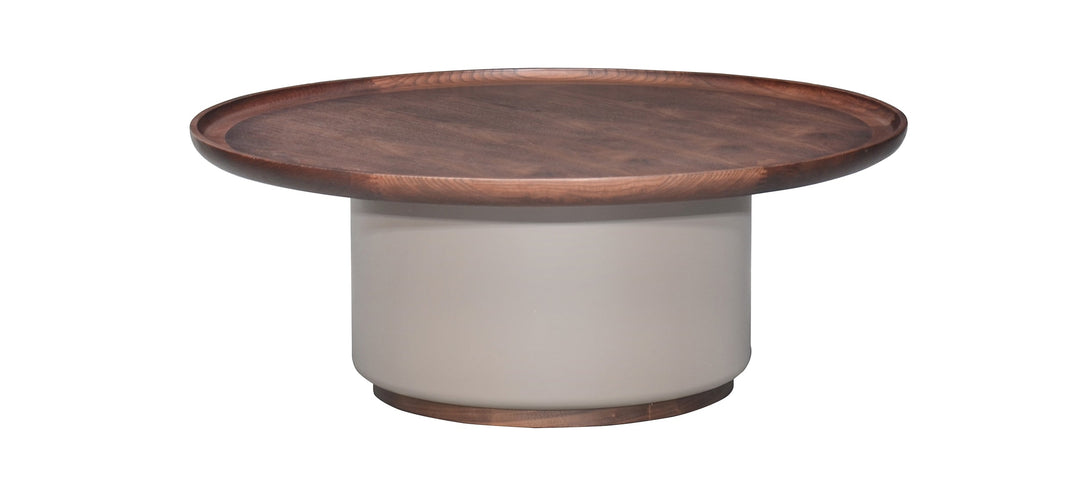 A contemporary round coffee table with a matte walnut color finish and accent brass gold base.