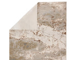 A rectangular area rug with a marble-like pattern in brown and gray tones.