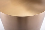 Close-up of a gold circular object on a white background
