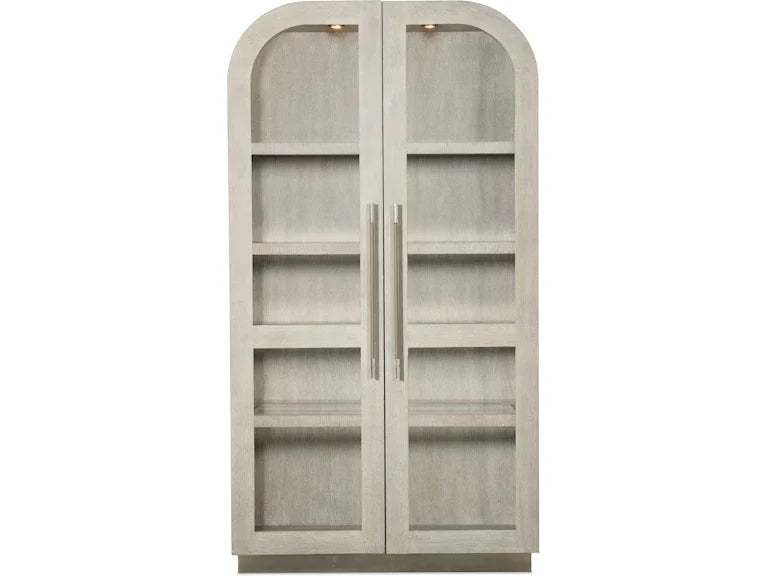 A gray wooden cabinet with two doors and glass panel inserts, standing upright.
