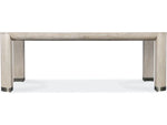 Dining table with a light wood finish on a white background