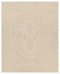 Beige area rug with a subtle pattern on a beige background