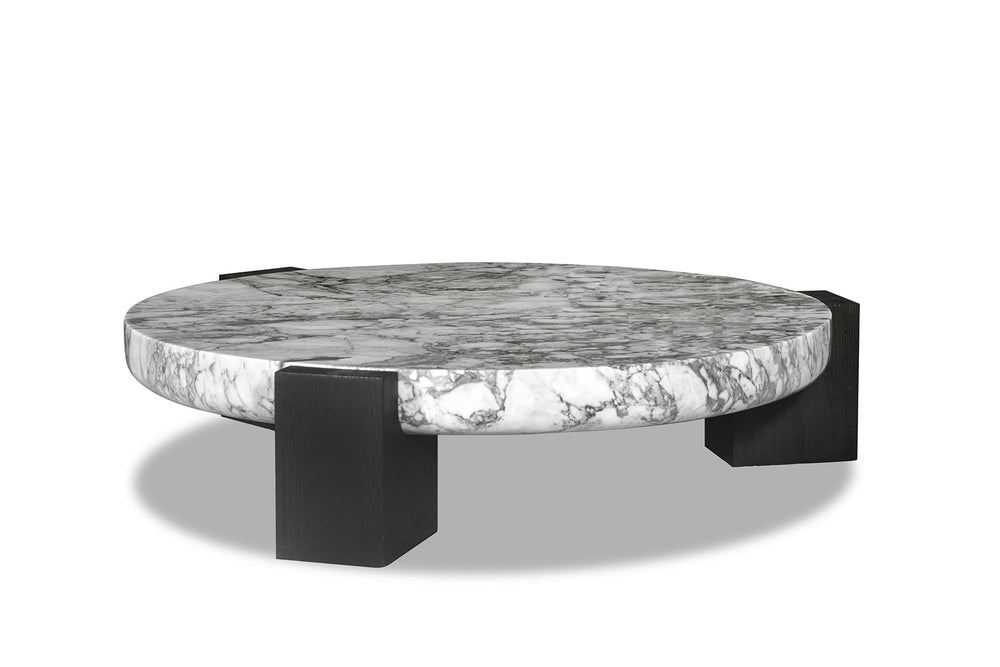 A round marble coffee table with solid ash legs.