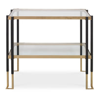 Two-tiered glass table with black and gold frame on a white background