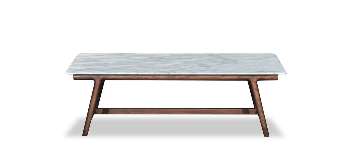 Coffee table with marble top and wooden legs on a white background