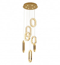 A gold-colored LED chandelier with a modern design, featuring circular and oval shapes with crystal accents, suspended by adjustable cords.