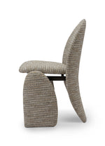 Modern chair with a textured design on a white background