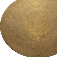 Close-up of a textured gold circle