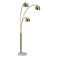 A modern industrial style metal floor lamp with a gold finish, featuring a central stem and multiple curved branches with spherical lamp shades.
