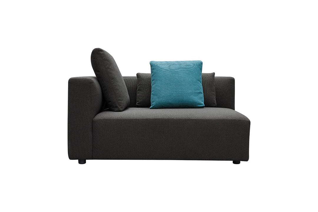 Gray sofa with two cushions, one blue and one gray, on a white background