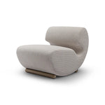 Modern beige armchair on a white background