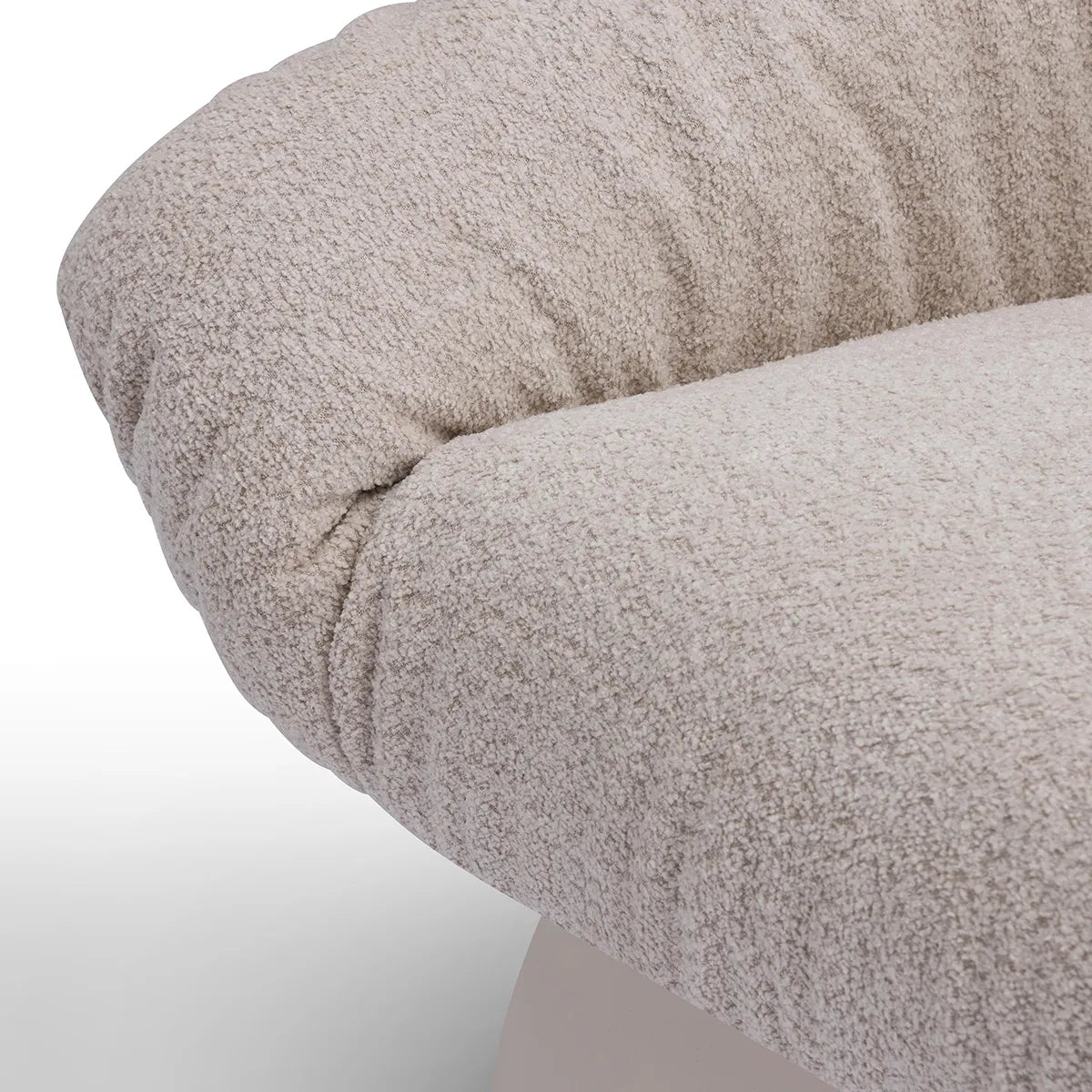 Close-up of a textured beige fabric on a white background
