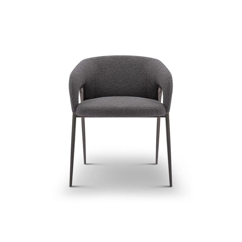 Gray upholstered chair with metal legs on a white background