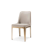 Beige chair with gold legs on a white background
