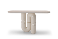 Modern table with unique pipe-like base on a white background
