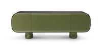 Modern green coffee table with a black top on a white background