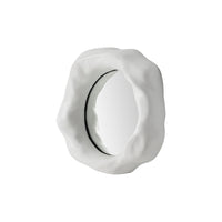 A middle Organic form mirror with a white background